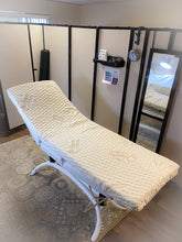 Load image into Gallery viewer, Massage bed ready for action. Give your customer the comfort they deserve. Rolls for storage made in California Eye lash bed artist